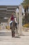 Young Palestinian Arab boy riding a horse outside the old city walls in Jerusalem