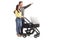 Young parents pushing a baby stroller