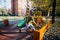 Young parkour guy doing tricks,flips and exercising at a playground