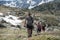 Young People in the Beautiful view hiking in the Andorra Pyrenees Mountains in Ordino, near the Lakes of Tristaina