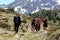 Young People in the Beautiful view hiking in the Andorra Pyrenees Mountains in Ordino, near the Lakes of Tristaina