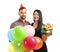 Young people with birthday balloons and gift box on white background