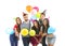 Young people in birthday party caps with balloons on white background