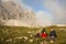 Young people camping while hiking in the mountains