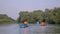 Young people canoeing in the lake