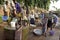 Young people fetch water at a water pump