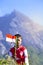 Young People with Flag. Indonesia Flag, Indonesia Independance Day with mt Merapi background