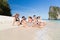 Young People Group On Beach Summer Vacation, Happy Smiling Friends Lying Sand Seaside