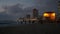 Young People play games on the Tel Aviv beach shortly after sunset