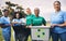 Young people, recycling and volunteer portrait of group doing outdoor waste and garbage cleaning. Earth day, charity and