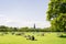 Young people, students of Edinburgh University enjoy a sunny day