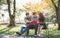 Young people studying reading book in park. education study by read.