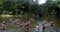 Young people swim in Babinda Boulders in Queensland Australia