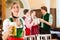 Young people in traditional Bavarian Tracht in restaurant or pub