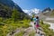 Young people are trekking in highlands of Altai mountains, Russia