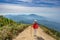 Young people walking on a hilltop in Doi Inthanon, Chiang Mai, Thailand