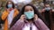 Young people wearing medical mask on street