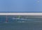 Young People Windsurfing In A Small Bay On The East Frisian Island Borkum