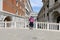 young photographer takes a lonely self-timer selfie during the lockdown in Venice in Italy