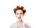 Young pinup housewife woman wearing curlers and