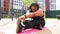 young plus size black african womanstretching body on mat outdoors alone, side view