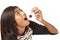 Young Polynesian girl eating a cherry