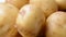 Young potatoes close up background right rotated