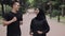 Young Preety Muslin Girl Wearing a Hijabt in the Park Meeting Atrractive Young Man Running Smiling Concept Healthy