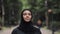 Young Preety Muslin Girl Wearing a Hijabt Running in the Park Concept Healthy Lifestyle Close Up.