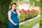 Young Pregnant Chinese Woman Portrait in Park