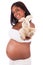 Young pregnant indian woman holding a plush