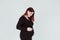 young pregnant woman of 21 weeks at home touching her belly and smiling. family concept