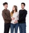 Young pregnant woman posing with two young man