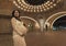 A young pregnant woman standing in front of an old heritage building