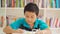 Young preteen boy doing homework