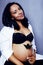 Young pretty african american woman pregnant happy smiling, life