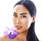 Young pretty asian woman with flower purple orchid close up  spa, womans day concept
