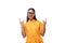 young pretty brunette lady dressed in a yellow dress shows a gesture of coolness and rock