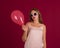 Young pretty girl with balloon, party