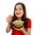 Young pretty girl with opened mouth and wide eyes holds glass bowl with popcorn isolated on white background