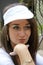 Young pretty italian woman with tennis hat