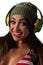Young Pretty Latino Woman Listening to DJ Style headphones