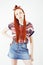 Young pretty red head teenage hipster girl posing emotional happy smiling on white background, lifestyle people concept