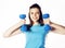 Young pretty slim blond woman with dumbbell isolated cheerful smiling, measuring herself, diet people concept on white