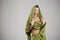 Young pretty woman in indian green dress