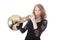 Young pretty woman playing french horn