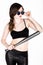 Young pretty woman in top and sunglasses holds grey baseball bat