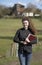 Young priest visiting her parish in the countryside