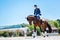 Young promising equestrian feeling exhausted after training