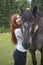 Young Redhead with Percheron Horse